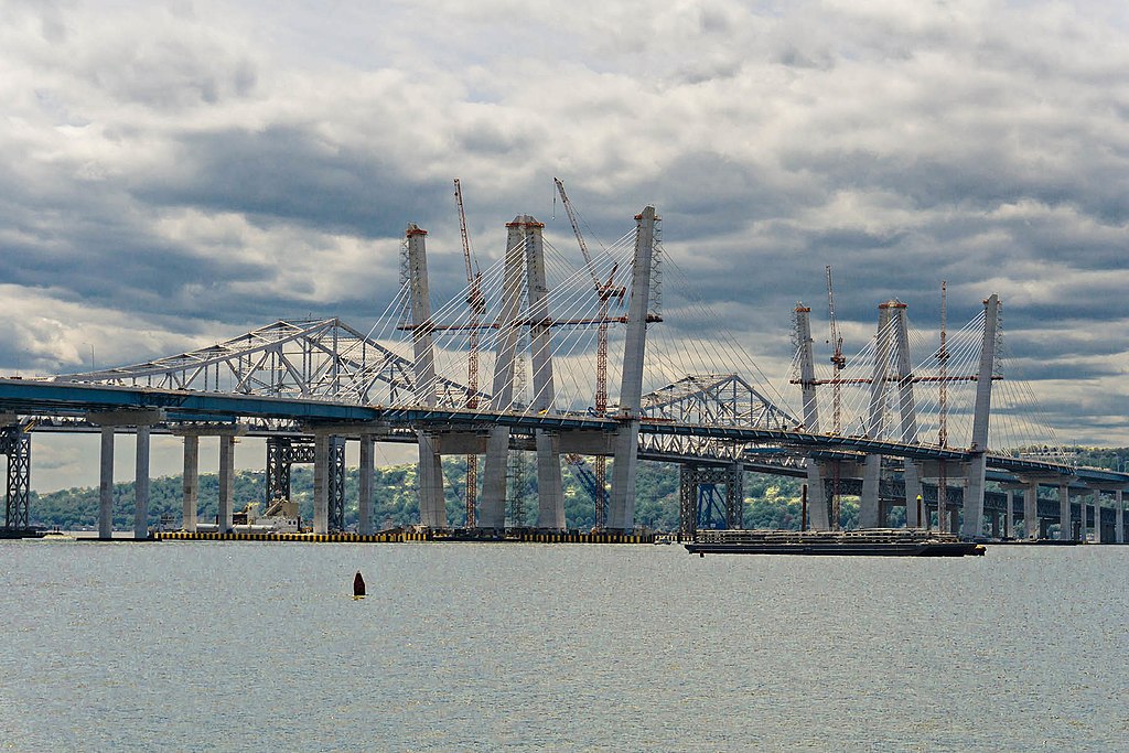 Taken from Wikimedia. Photo of New York’s Mario M. Cuomo Bridge during construction. Photo by Steve Strummer.