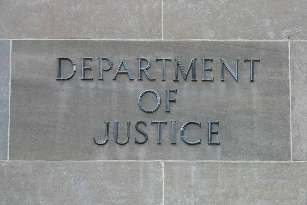 Photo of the Department of Justice building. Credit to Peter E, Flickr.