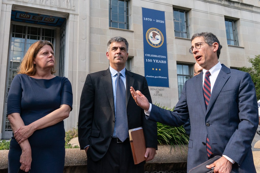 Bruce Brown, right, executive director of the Reporters Committee for Freedom of the Press, speaks accompanied by Washington Post Executive Editor Sally Buzbee, left, and Washington Post general counsel Jay Kennedy, center, after a meeting with Attorney General Merrick Garland at the Department of Justice, Monday, June 14, 2021, in Washington. (AP Photo/Alex Brandon)