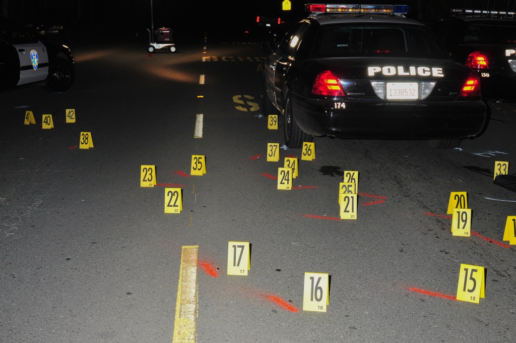 Evidence placards mark bullet casings and fragments following the fatal shooting of Sherman Peacock on Feb. 11, 2011. Vallejo later destroyed firearm evidence in the case. (Obtained by Open Vallejo through a California Public Records Act request)