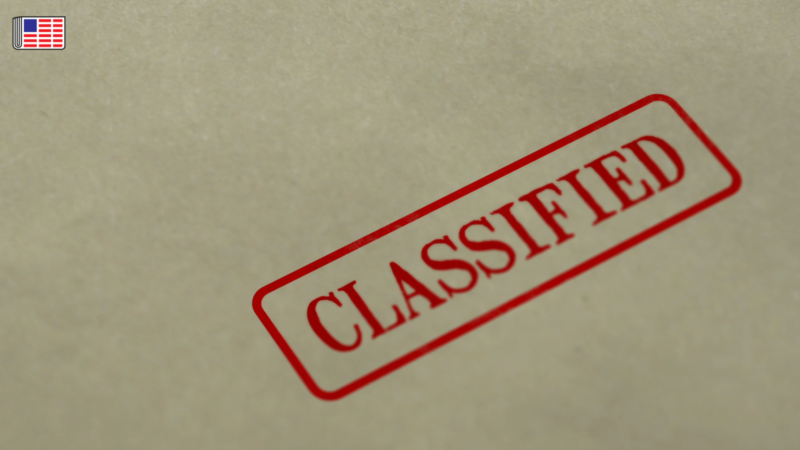 The word "Classified" is stamped in red with a red box around it on brown paper. On the top left corner, the Reporters Committee flag logo is shown.