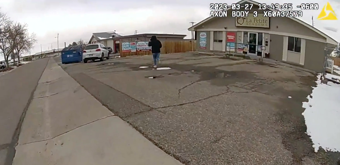 A screen grab from bodycam footage shows 17-year-old Mariana Martinez running away from police. Police later fatally shot the teenager after she pointed a gun at officers.