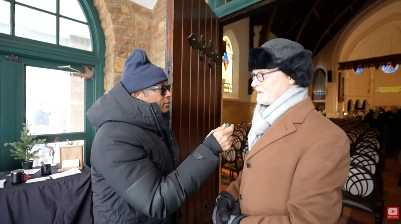 Journalist Don Lemon conducts an interview inside a church in Minnesota during a broadcast of his YouTube show.