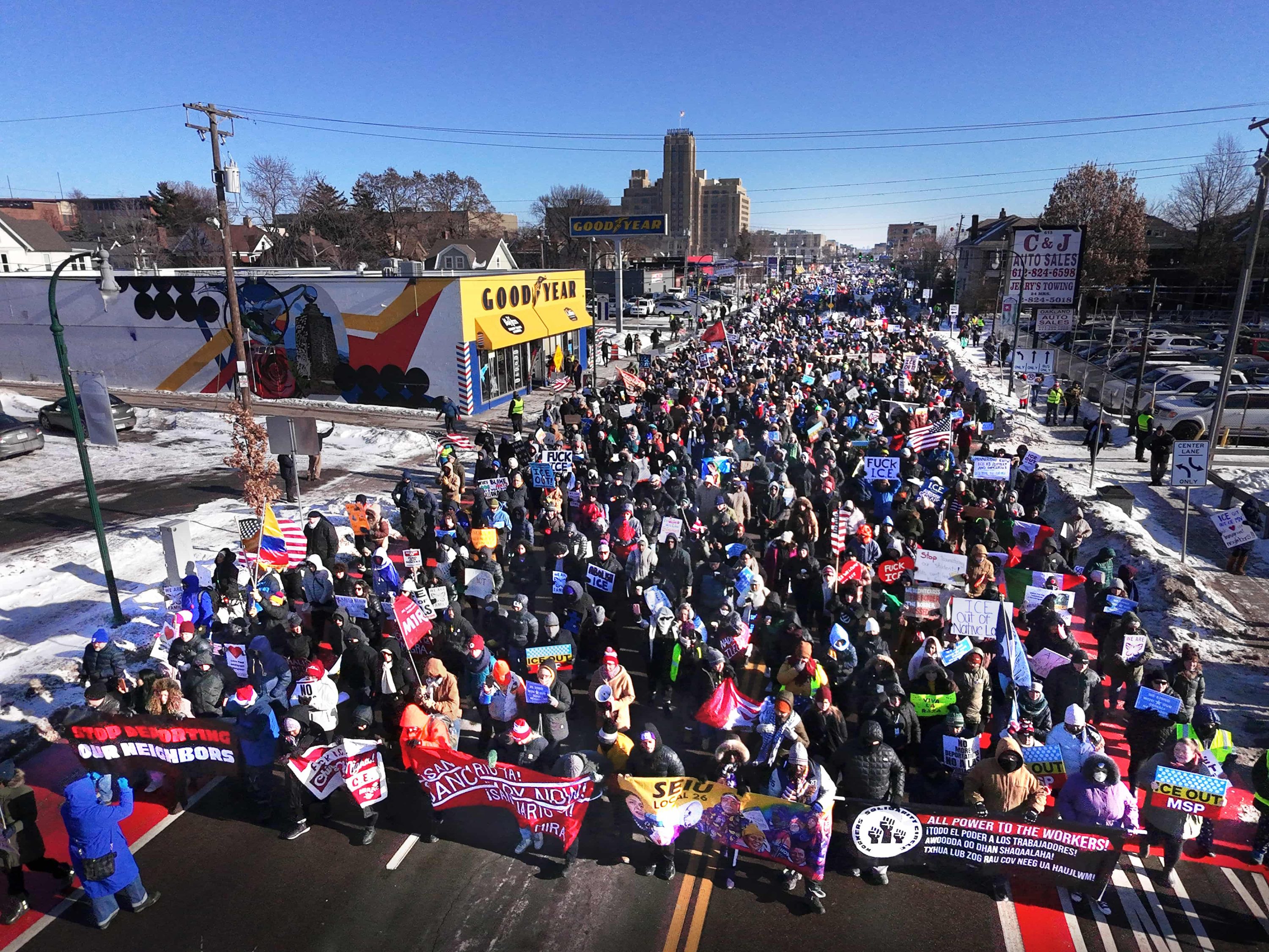 A drone photo of a large march against U.S. Immigration and Customs Enforcement on Lake Street in south Minneapolis on a cold and windy day, Dec. 20, 2025. (Credit: Rob Levine)