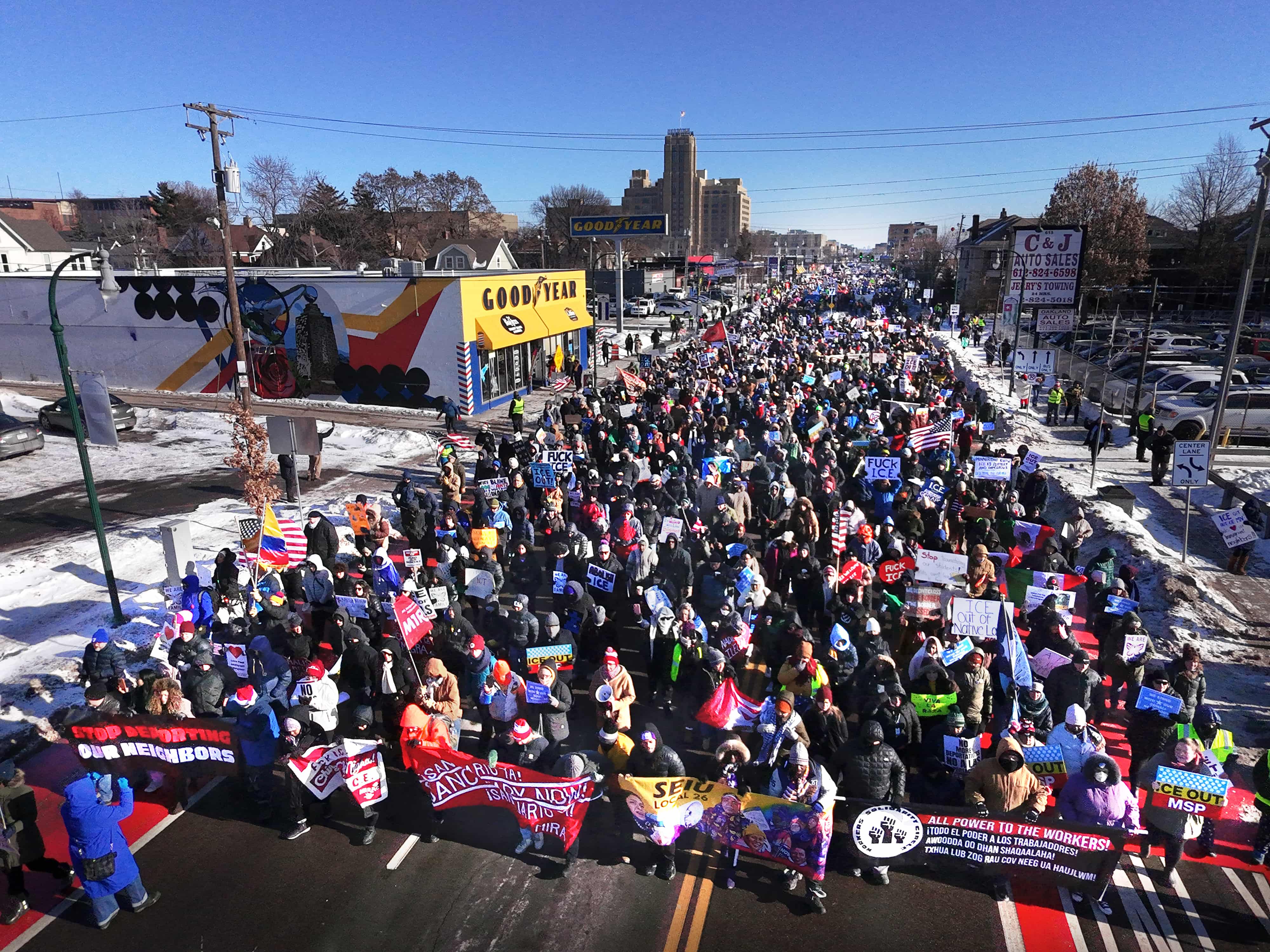 A drone photo of a large march against U.S. Immigration and Customs Enforcement on Lake Street in south Minneapolis on a cold and windy day, Dec. 20, 2025. (Credit: Rob Levine)